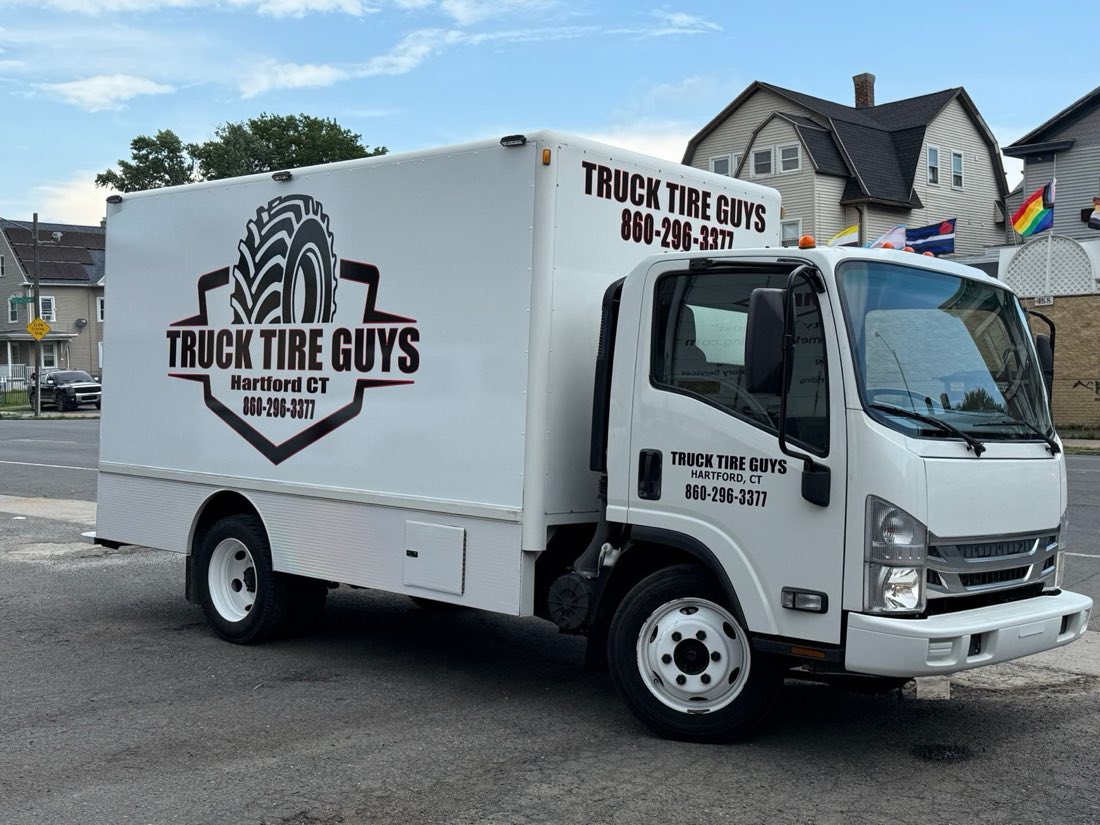 Freshly serviced heavy duty dump truck outside Rondinone's Auto & Truck in Hartford, CT